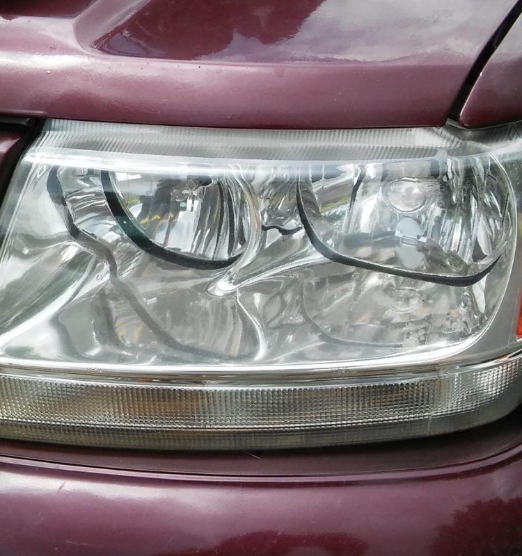 a after picture of a headlight restoration service
