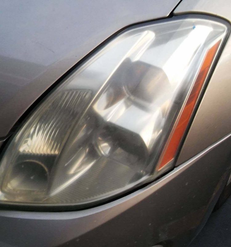 a before picture prior to a headlight restoration service