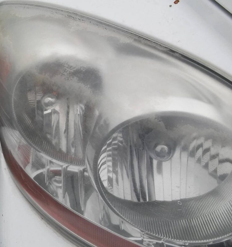 a after picture of a headlight restoration service