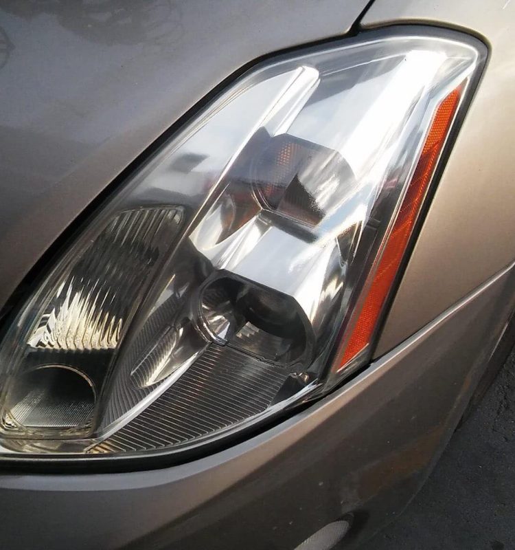 a after picture of a headlight restoration service